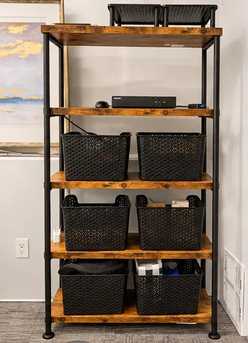 Office shelving with black storage baskets